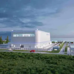 Wizualizacja nowoczesnej elektrowni atomowej Hitachi, która może powstać w Polsce. Obiekt zlokalizowany nad morzem, otoczony zielenią.