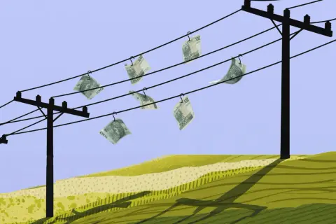 Pieniądze wiszą na przewodach energetycznych, symbolizując wysokie rachunki za prąd. Ile kosztuje energia elektryczna?